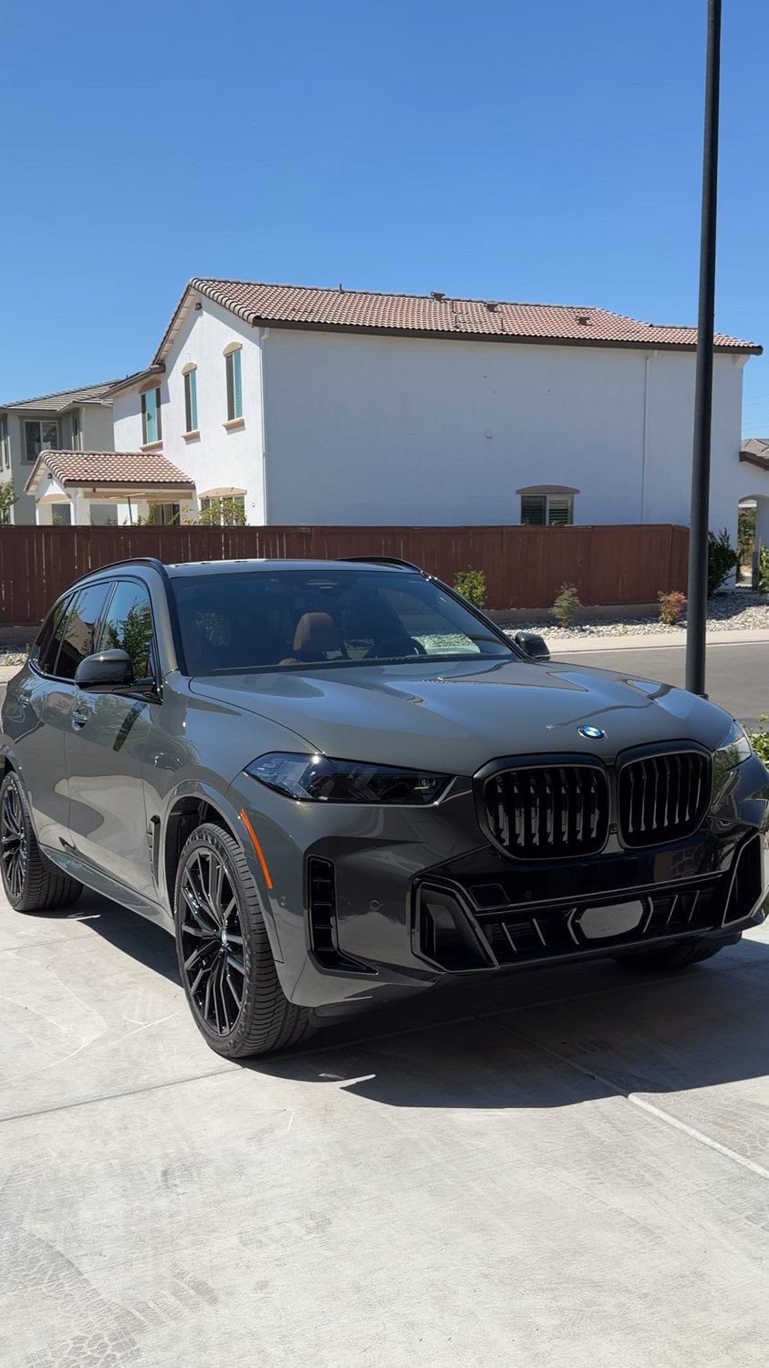 Gray BMW SUV after exterior detailing